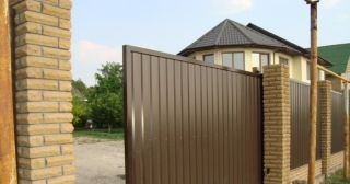 Купить откатные ворота из профнастила Ржев, цена от 1768 руб.